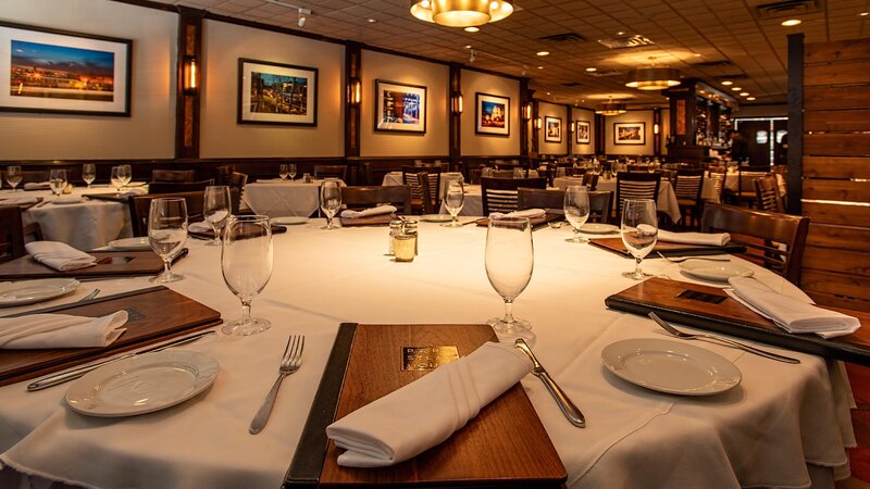 Close up view of round table set for eight